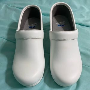 Only worn twice. NO scratches or worn marks. Dansko LT Pro.